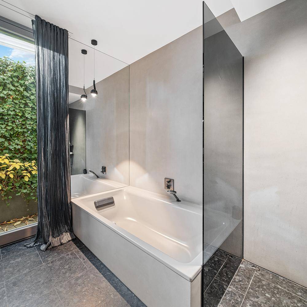 Detailverliebtes Upgrade eines Penthouses im Grünen