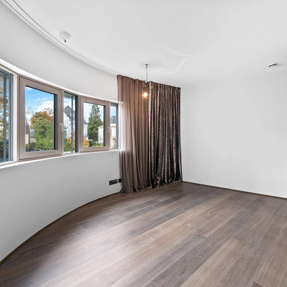 Detailverliebtes Upgrade eines Penthouses im Grünen