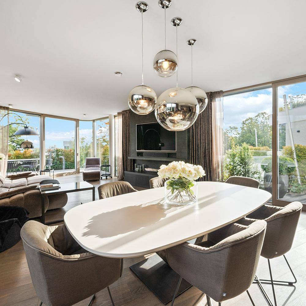 Detailverliebtes Upgrade eines Penthouses im Grünen