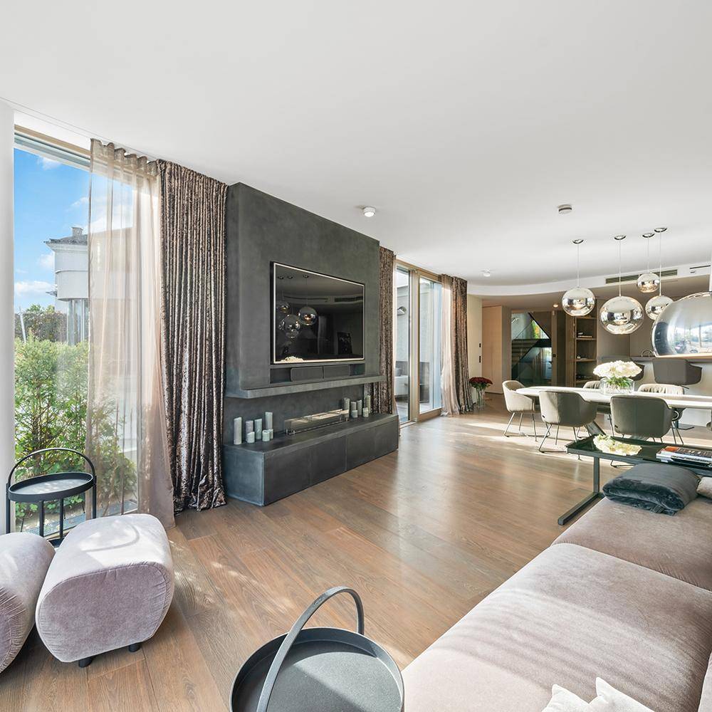 Detailverliebtes Upgrade eines Penthouses im Grünen