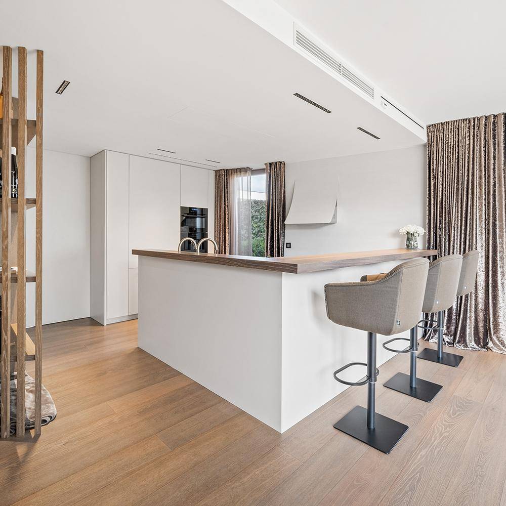 Detailverliebtes Upgrade eines Penthouses im Grünen