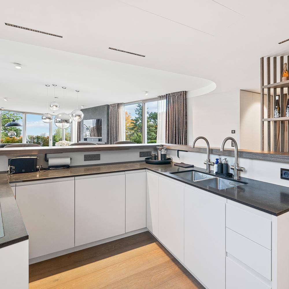 Detailverliebtes Upgrade eines Penthouses im Grünen